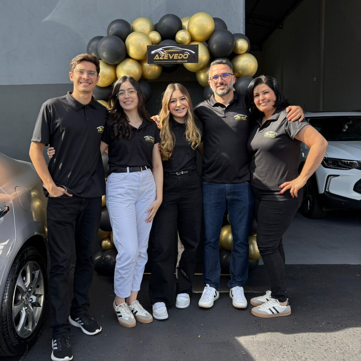 Icone laranja de um aperto de mãos